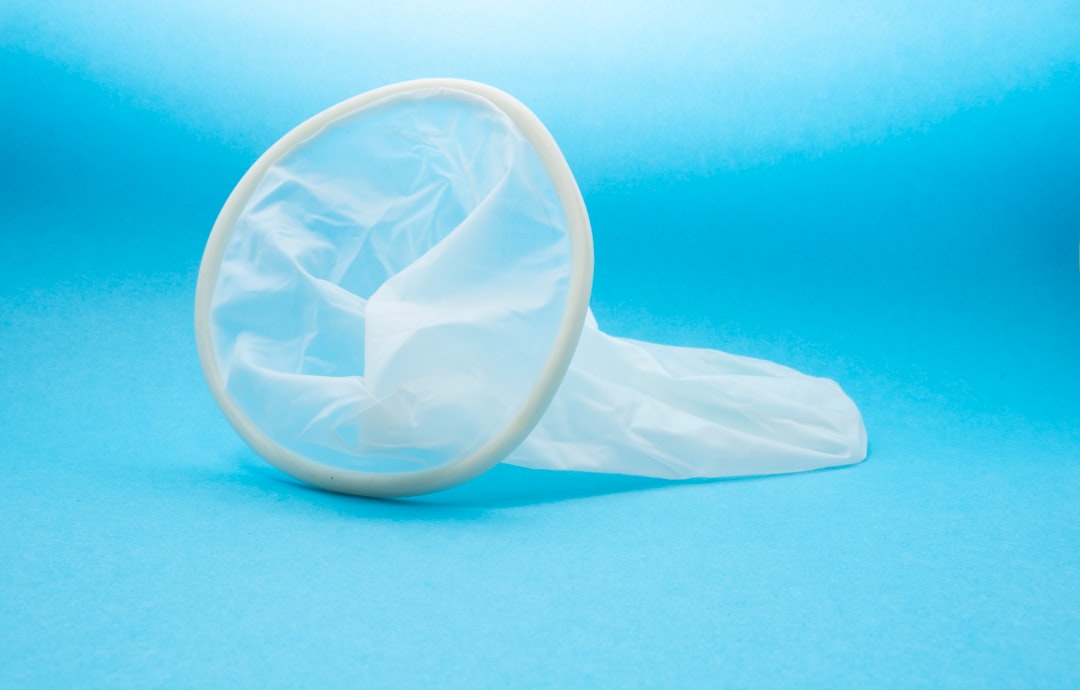 white condom in blue background