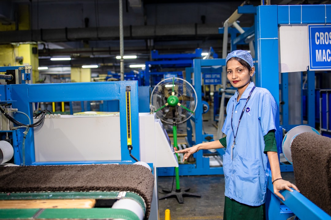 A woman works in a modern factory.
