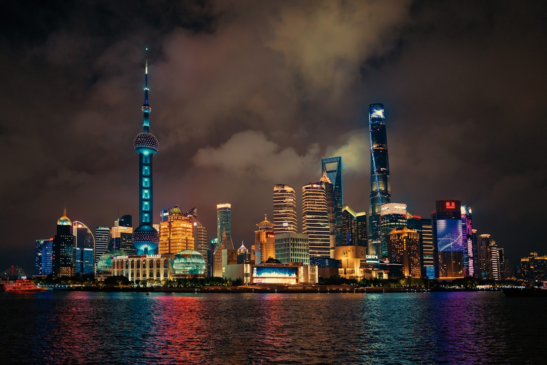 Vibrant cityscape skyline at night with colorful lights