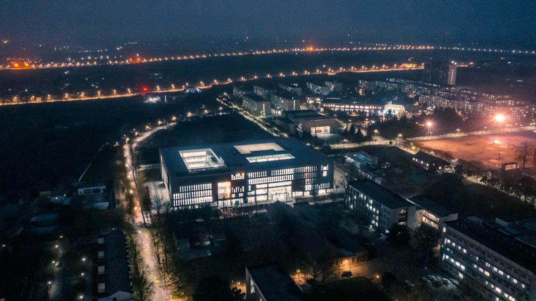 Modern illuminated building complex at night