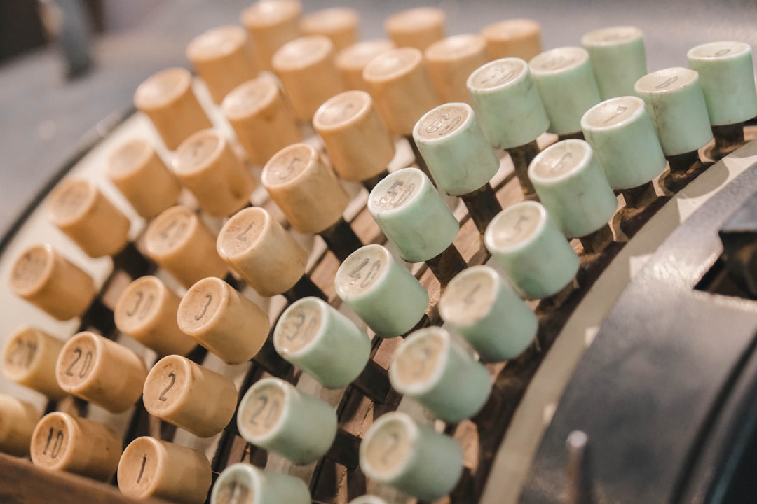 Close-up of old typewriter keys in rows.