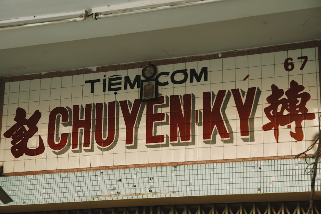 a sign on the side of a building advertising a restaurant