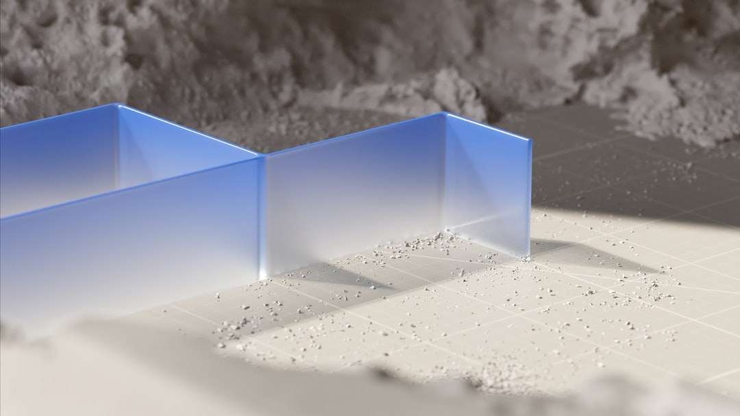 a couple of blue boxes sitting on top of a table