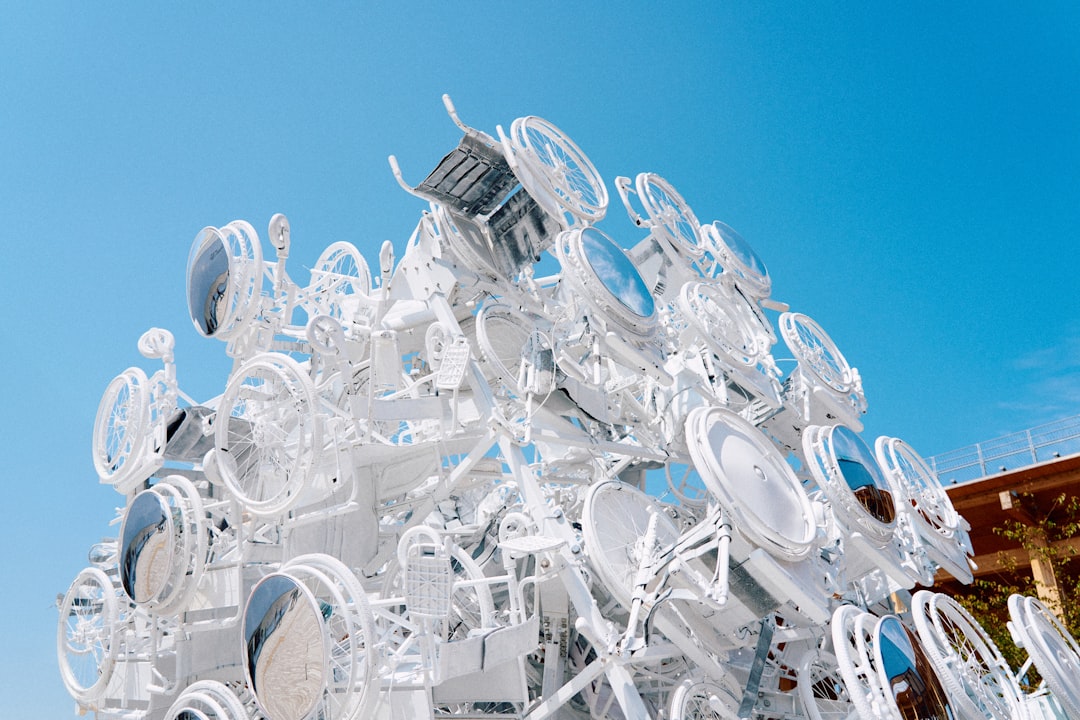 Sculptural art installation with shiny, round components.