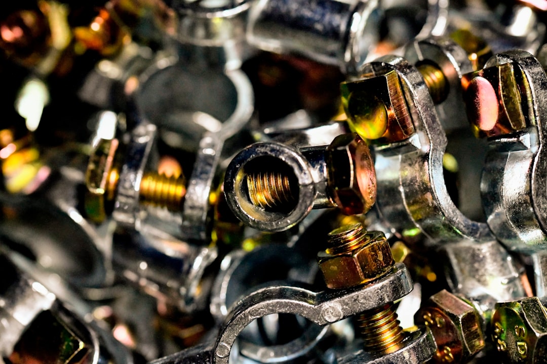 A pile of metal fittings and nuts