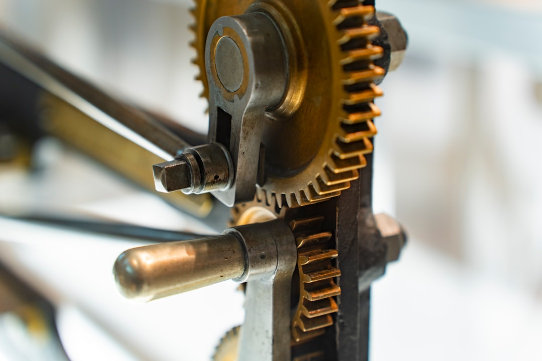 Gears interlock, showing intricate mechanical design.