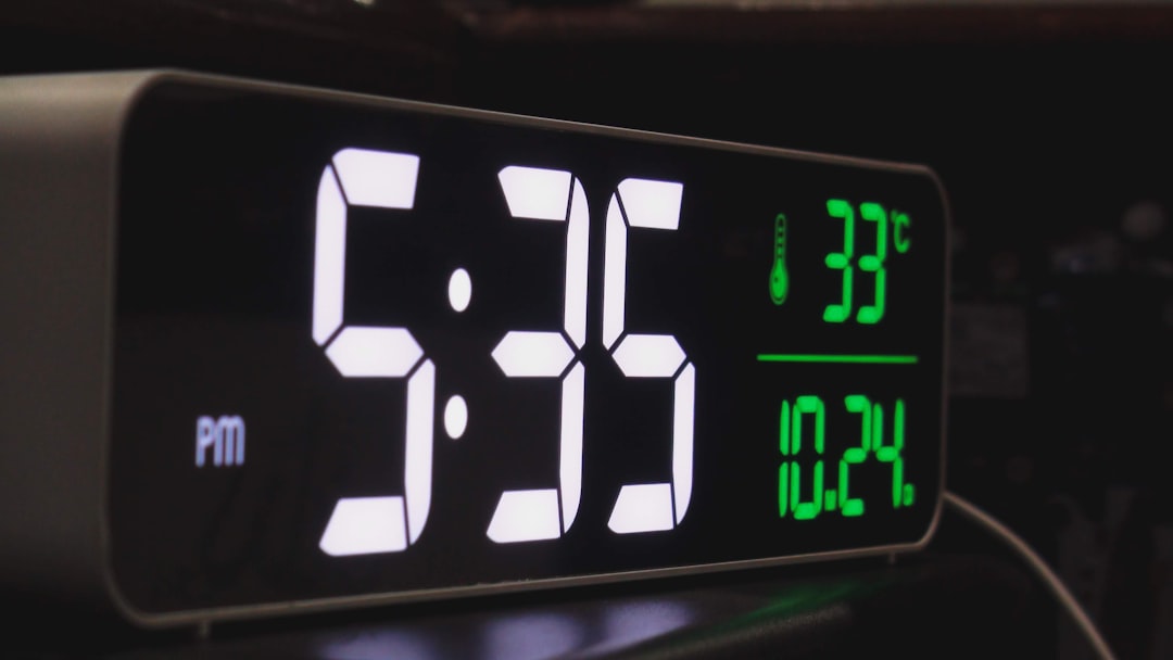 Digital clock displaying 5:35 pm and temperature