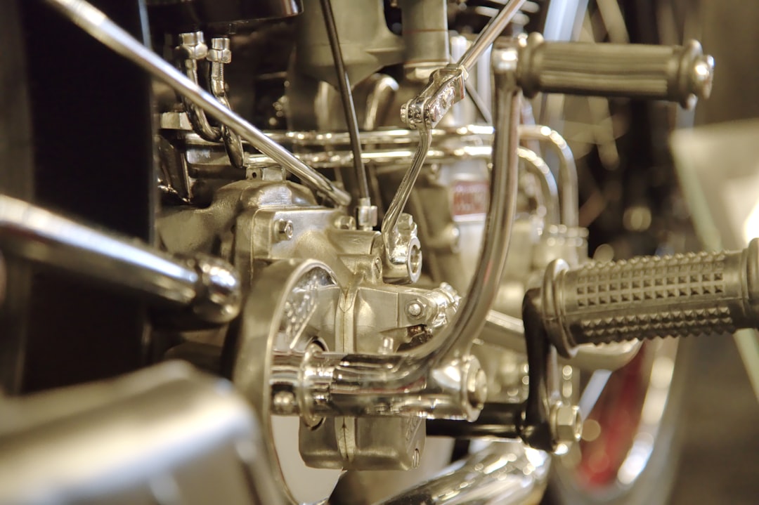 Close-up of vintage motorcycle engine and handlebars