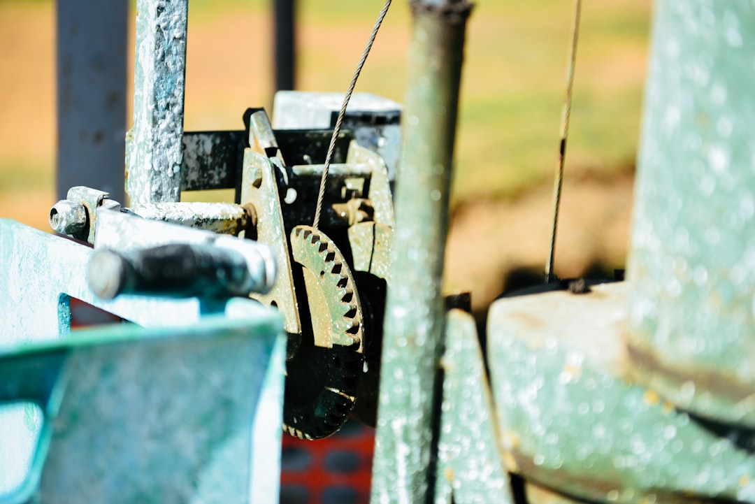 a close up of a machine that is in a field