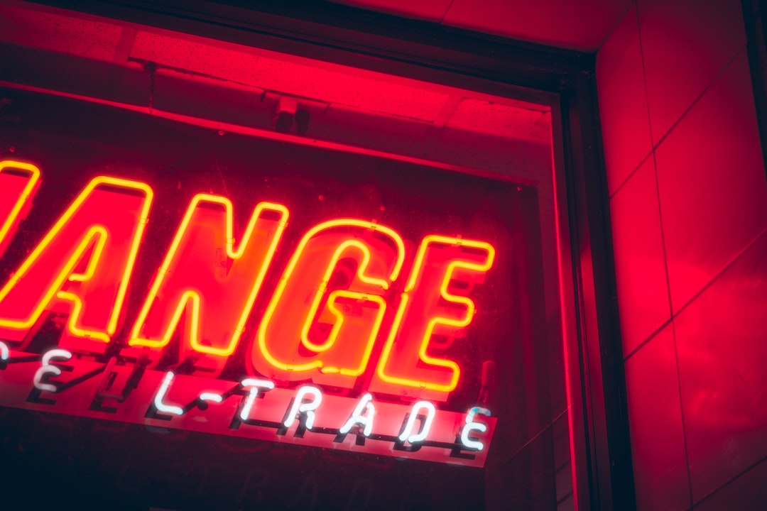 Red neon sign for exchange and l-trade