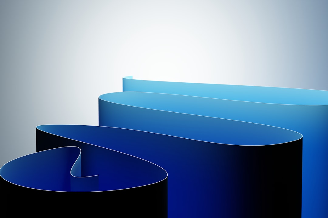 Blue ribbons flowing against a gradient background