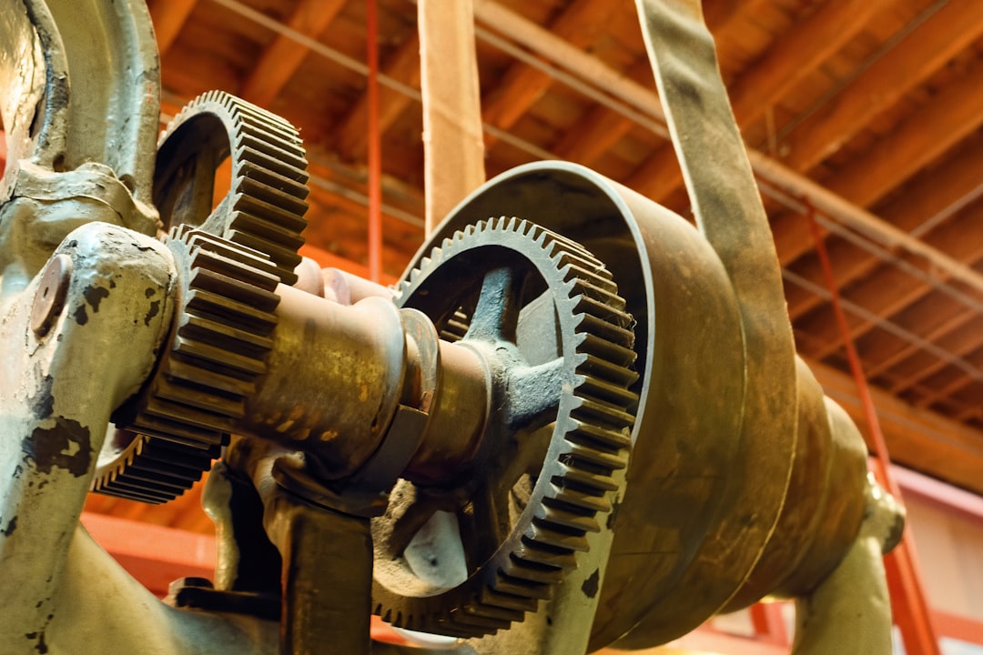 Close-up of old industrial gears and machinery.
