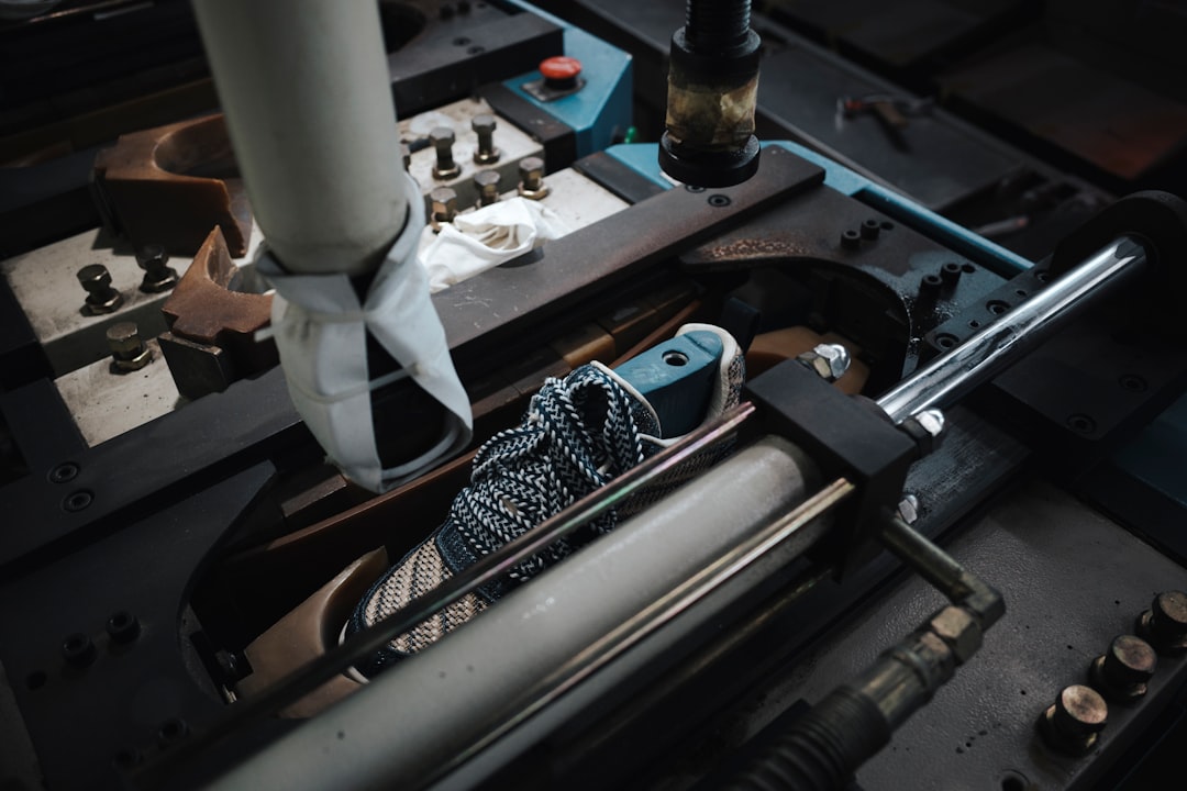 Close-up of a machine with a shoe inside