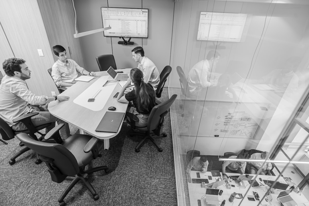 Team meeting in a modern conference room.