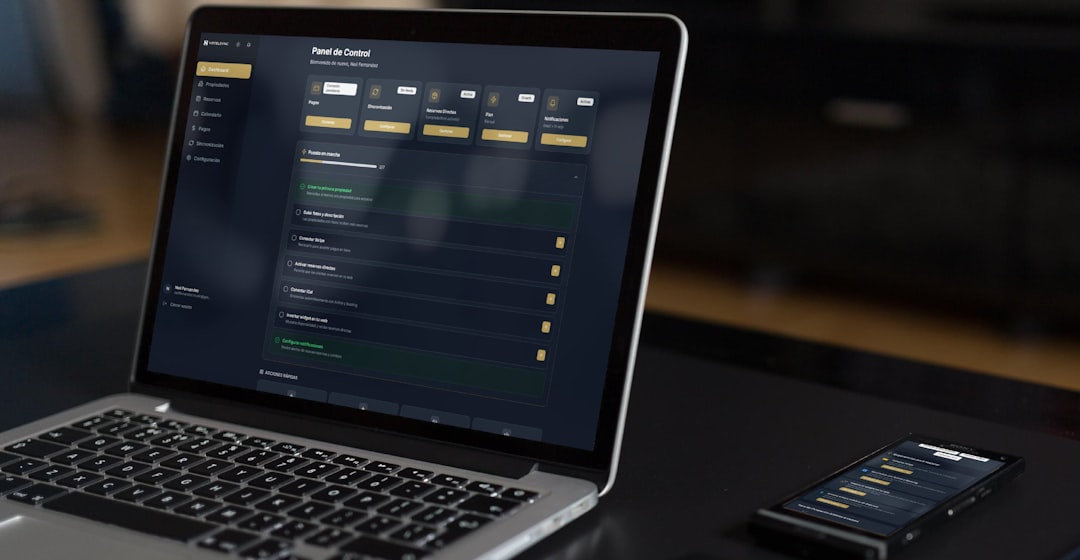 Laptop and phone displaying financial data