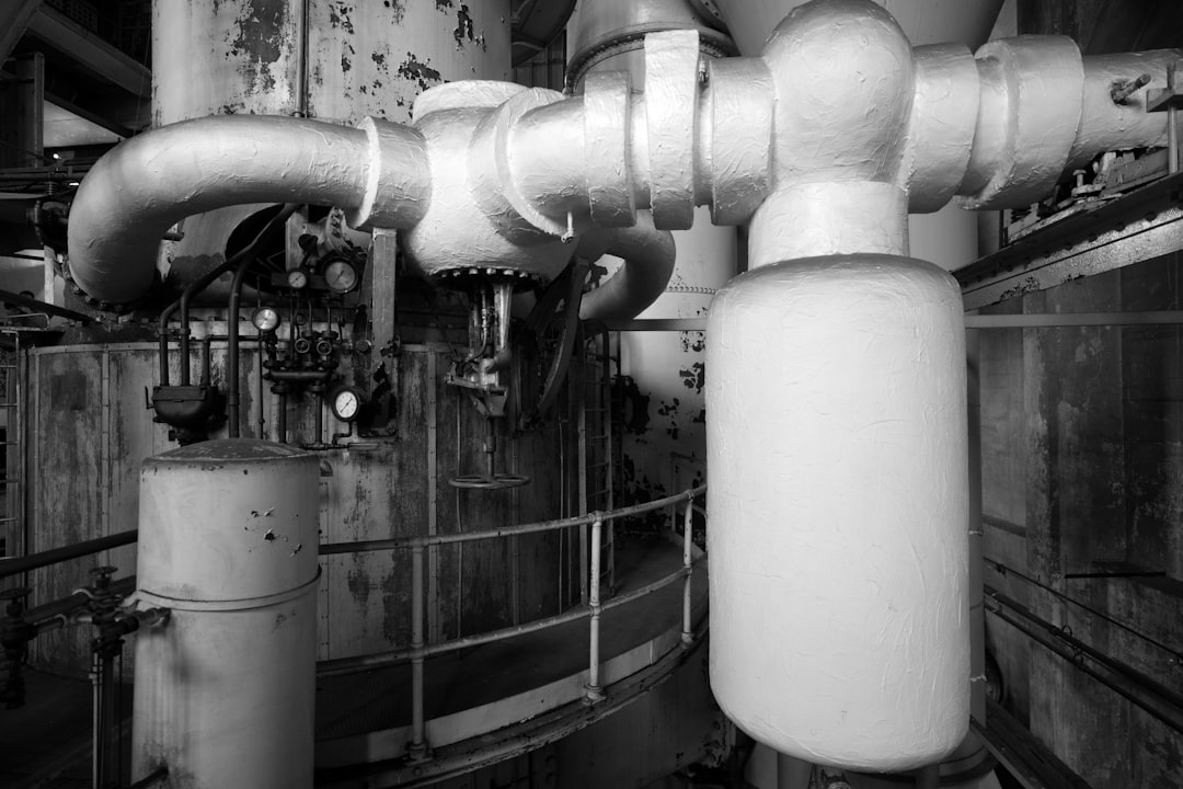 Industrial pipes and machinery in a factory