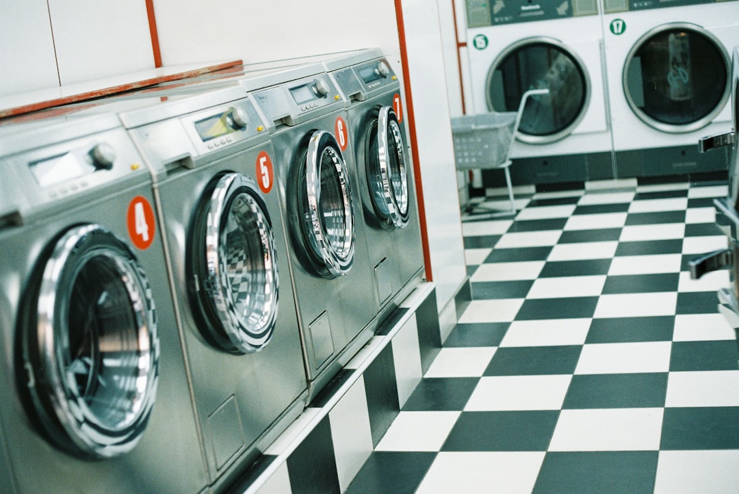 Row of washing machines in a laundromat
